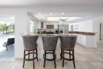The Kitchen offers Additional Seating with an Extended Bar Counter